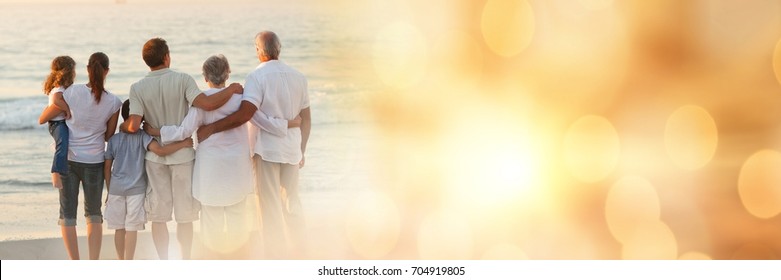 Digital Composite Of Family Standing On Beach With Backs To Camera Wide Shot