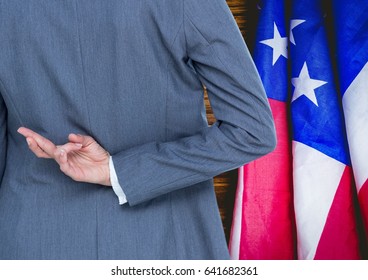 Digital composite of fingers crossed. USA - Powered by Shutterstock