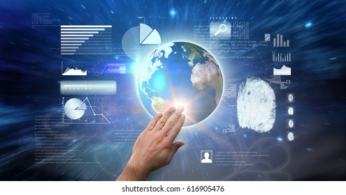Digital composite of Hand touching globe on screen