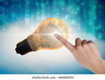 Digital composite of Hand Touching Light bulb fingerprint