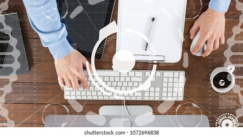 Digital composite of Hands using computer with overlays