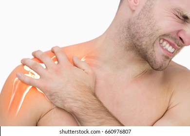 Digital composite of highlighted shoulder pain of man against white background