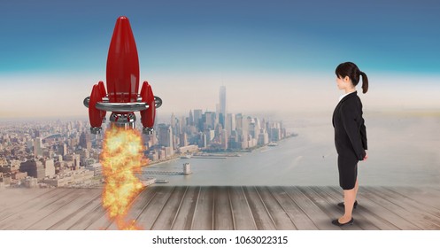 Digital composite image of businesswoman standing on pier and watching rocket launch against city - Powered by Shutterstock