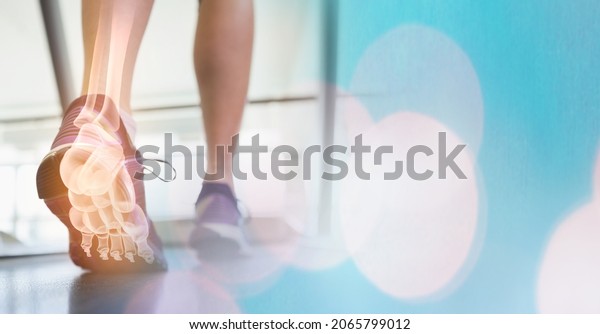 Digital composite image of leg bones of athlete\
running on treadmill in gym with sports shoes. fitness and healthy\
lifestyle concept.