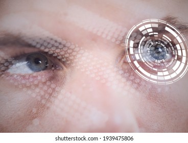 Digital composite image of round scanner against close up of male human eyes. cyber security and digital interface technology concept