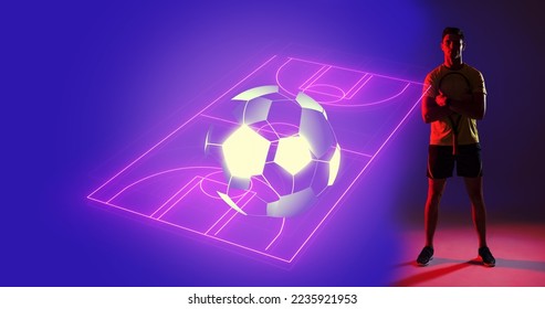 Digital composite image of young caucasian player with illuminated neon soccer field, copy space. Computer graphic, soccer, sport, design, athlete, competitive sport. - Powered by Shutterstock