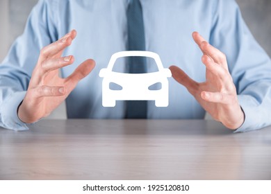 Digital Composite Of Man Holding Car Icon.Car Automobile Insurance And Car Services Concept. Businessman With Offering Gesture And Icon Of Car