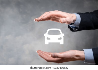 Digital Composite Of Man Holding Car Icon.Car Automobile Insurance And Car Services Concept. Businessman With Offering Gesture And Icon Of Car.