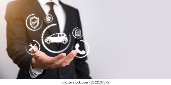 Digital Composite Of Man Holding Car Icon.Car Automobile Insurance And Car Services Concept. Businessman With Offering Gesture And Icon Of Car.