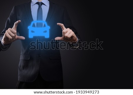 Digital composite of Man holding car icon.Car automobile insurance and car services concept. Businessman with offering gesture and icon of car Сток-фото © 