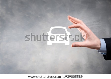 Digital composite of Man holding car icon.Car automobile insurance and car services concept. Businessman with offering gesture and icon of car. Сток-фото © 