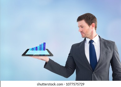 Digital composite of model with device with graph