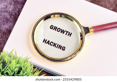 Digital composite, multiple exposure, coding, networking, technology and network server concept. GROWTH HACKING in a notebook on a purple background through a magnifying glass, top view.