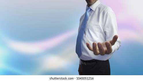 Digital composite of Open hand and soft colorful background