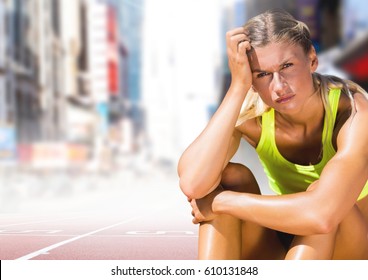 Digital Composite Of Sad Disappointed Athlete Runner Sitting Down In City