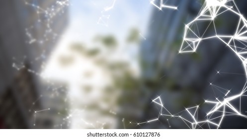 Digital composite of White interface against blurry buildings