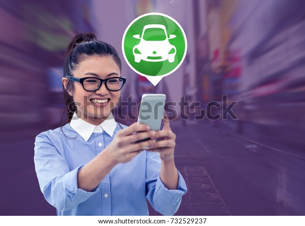 Digital composite of Woman holding phone with car\
icon in city