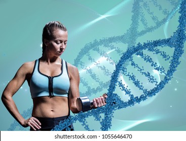 Digital composite of woman with weights with blue dna chains - Powered by Shutterstock