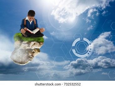 Digital composite of Young boy on floating rock platform  in sky reading book with futuristic interface - Powered by Shutterstock - Get 15% off with code: PIKWIZARD15