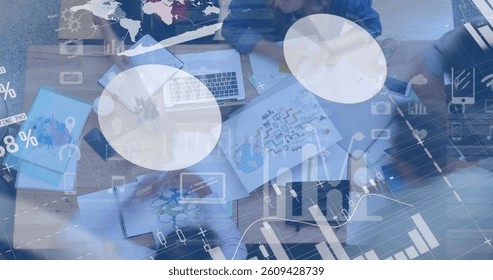 Digital composition of financial data processing against overhead view of people working in office. global finances and business concept - Powered by Shutterstock - Get 15% off with code: PIKWIZARD15