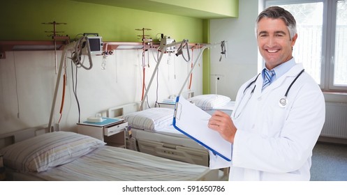 Digital composition of smiling doctor holding clipboard in hospital - Shutterstock ID 591650786