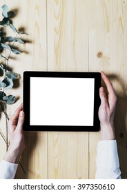 Digital Computer With A Empty Blank Screen Monitor In The Girls Hands  With Space Screen For Your Information Or Content On Table Background  With Natural Wood Planks Wooden Texture Top View Vertical