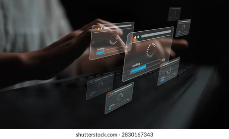 Digital Concept of Data Loading with User Hand Typing on Keyboard Surrounded by Floating Browser Windows with Loading Icons in Dark Background Gluon.