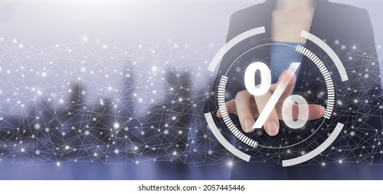 A digital concept of discount and commission. Hand touch digital screen hologram percent sign on city light blurred background. Giving discounts to customers - Shutterstock ID 2057445446