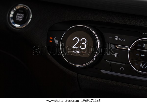 Digital
control panel car air conditioner dashboard. Modern car interior
conditioning buttons inside a car close up
view.