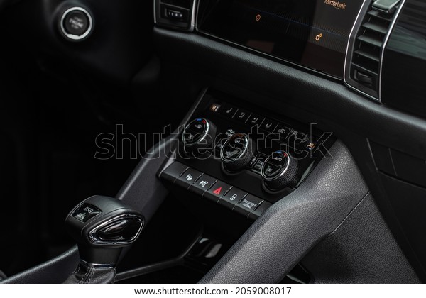 Digital\
control panel car air conditioner dashboard. Modern car interior\
conditioning buttons inside a car close up\
view.