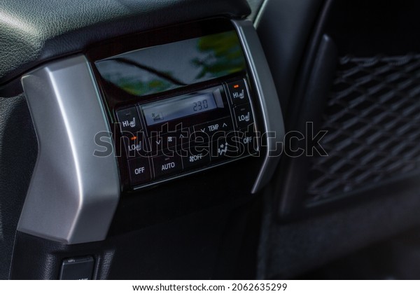Digital
control panel car air conditioner dashboard. Modern car interior
conditioning buttons inside a car close up
view.