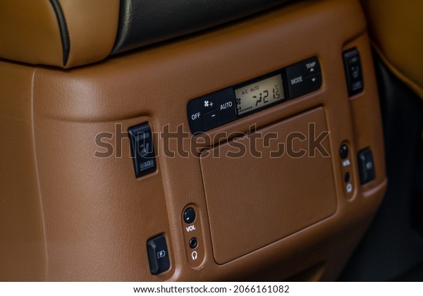 Digital\
control panel car air conditioner dashboard. Modern car interior\
conditioning buttons inside a car close up\
view.