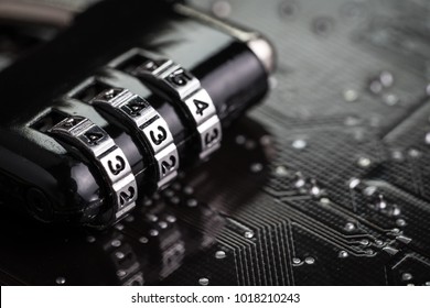 Digital Cyber Safety Or Security Encryption Concept, Code Numbers On Combination Pad Lock On Computer Circuit Board With Solder, Technology To Encode Online Information Or Data Protection.