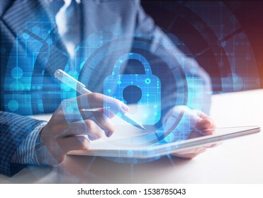 Digital Cybersecurity Concept Of Neutralizing Cyber Threats On Internet. Firewall And Antivirus Software. Virtual Locking Mechanism To Access Shared Resources. Businessman Working At Tablet Computer.