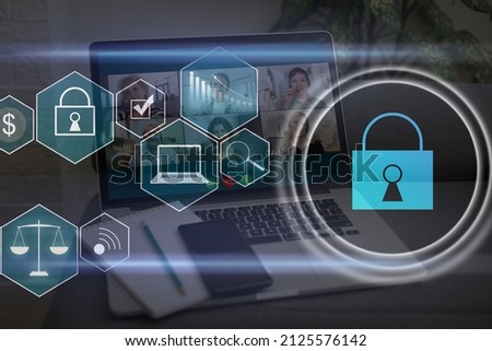 Digital cybersecurity and network protection concept. Virtual locking mechanism to access shared resources. Interactive virtual control screen with padlock. laptop on background