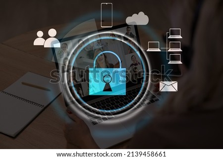 Digital cybersecurity and network protection concept. Virtual locking mechanism to access shared resources. Interactive virtual control screen with padlock. laptop on background