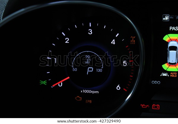 Digital dashboard of a modern car, showing all\
different functions