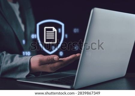 Digital data security concept showing a business professional presenting a glowing shield and document icon beside a laptop, symbolizing secure access, privacy, file protection, and cybersecurity