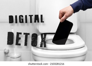 Digital detox inscription, refusal of the phone. a man's hand throws the phone into the toilet because of a breakdown or refusal of calls and social connections of the Internet and mobile