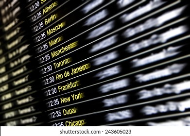 Digital display at international airport - Flight connections with cities around the world - Concept of travel lifestyle with exclusive destinations worldwide - Departure and arrivals terminal gates - Shutterstock ID 243605023