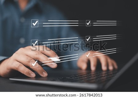 Digital to do list system displayed over man working on laptop, focusing on productivity, task management, and strategic planning for successful project execution in personal or business setting