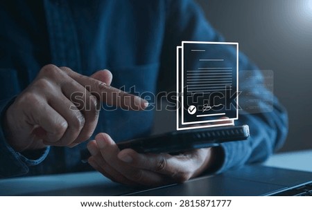 Digital document approval on smartphone, person managing electronic signatures paperless workflow online verification contract processing and secure business documentation.