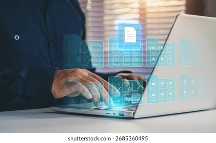Digital document management system concept. secure cloud storage. DMS. Data organization, File sharing, Store encrypted files. Enterprise solutions. Businessman using laptop saving classifying files.