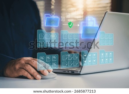 Digital document management system concept. secure cloud storage. DMS. Data organization, File sharing, Store encrypted files. Enterprise solutions. Businessman using laptop saving classifying files.