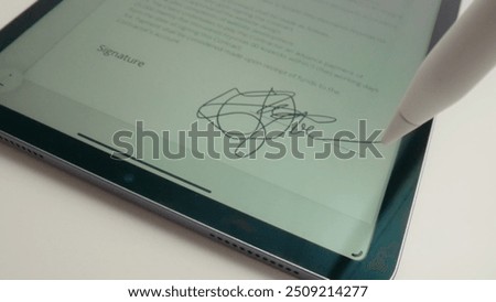 Digital Document Signing Process with Electronic Signature on Tablet