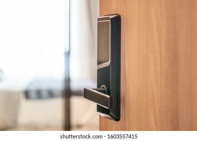 Digital door lock security system close-up with blur background - Shutterstock ID 1603557415