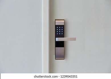 Digital door lock security systems for good safety of apartment or house 
door. Electronic door handle with key pads numbers. Selective focus