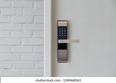 Digital door lock security systems for access protection of hotel, apartment door. Electronic door handle with key pads numbers. Selective focus