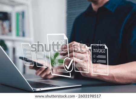 Digital E-Invoice and Billing Management Concept. Businessman using laptop and pen with invoice documents, representing electronic invoicing and digital billing systems. invoice for payment, receipt,