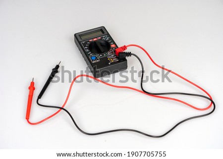 digital electrical Tester multimeter on white background.